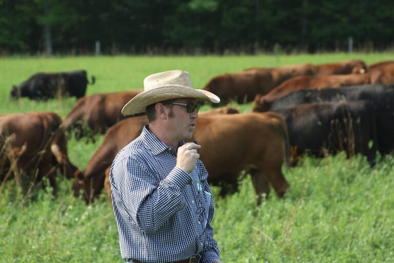 Jason Rowntree speaking on a farm