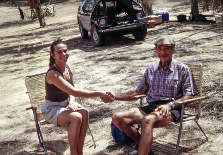 Daniela Howell and Allan Savory shaking hands in the early 90's
